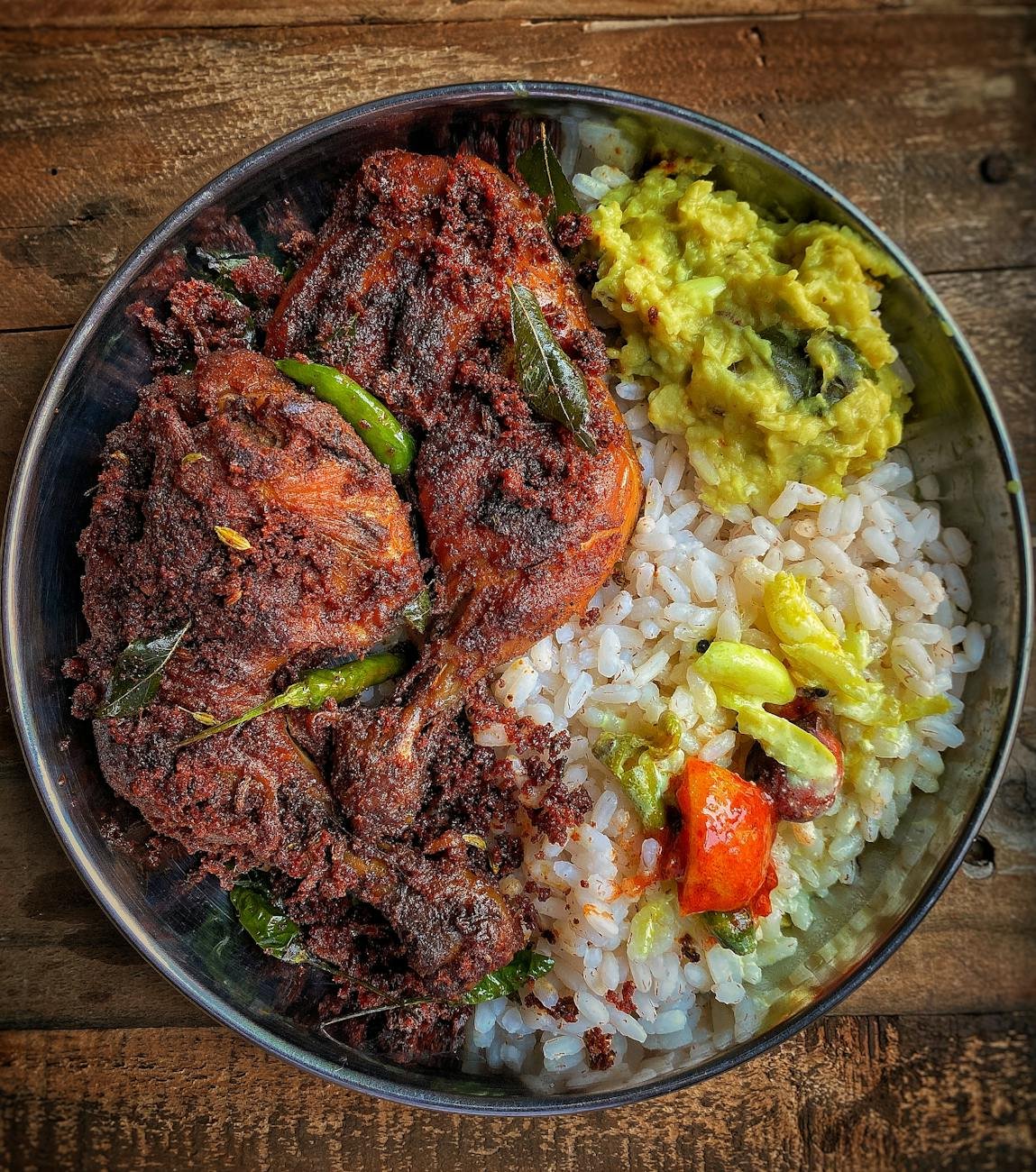 cooked food on stainless steel bowl